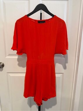 Adelyn Rae Vibrant Red Flutter-Sleeve Romper